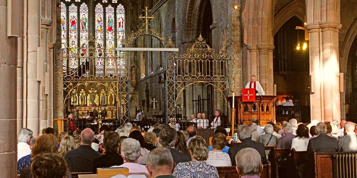 Minister preaching at service in St Editha's Church Tamworth