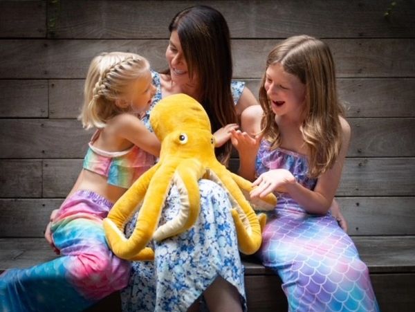 Maria Mandel Dunsche with her daughters, the inspiration behind her Brave Mermaids book series.