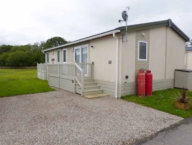 Two/three bedroom holiday park home for sale in Pentewan, St Austell, Cornwall, PL26