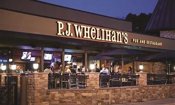 P.J. Whelihan's pub and restaurant exterior at night.