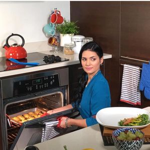 Glenda gets to bake on set.  Pillsbury Doughboy  