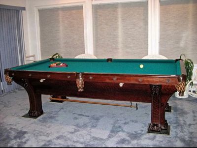 Antique pool table restoration, moving, setup.