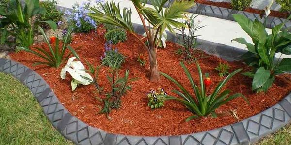 Update your curb appeal with custom concrete landscape borders, edging and planting. 