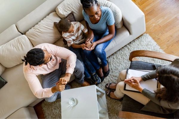 Family counseling session with therapist.