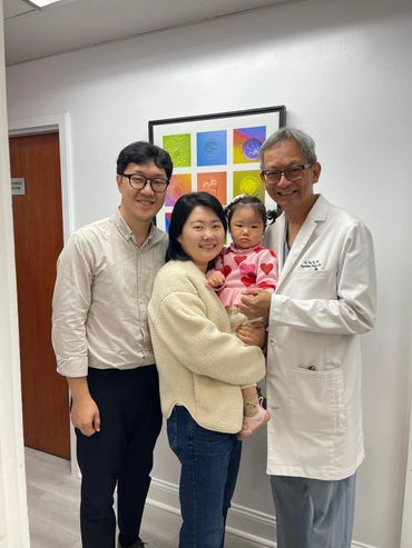 A family with a doctor in a clinic.