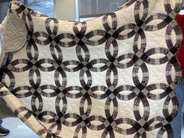 Double Wedding Ring Quilt in black, grey and white