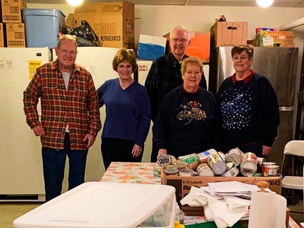 Food pantry with some of the church's volunteers