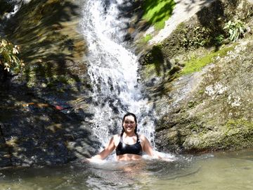 100% Kokoda swimming in the waterfalls on the Kokoda Track in PNG