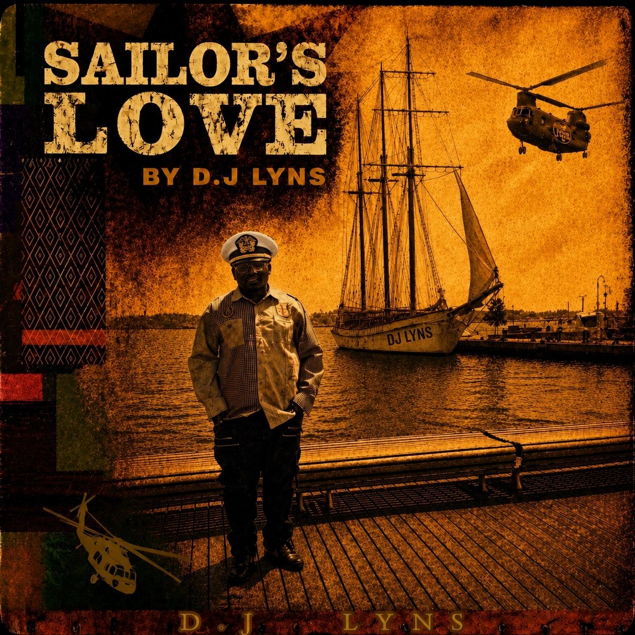 A sailor standing by a dock with a ship and helicopter in the background.