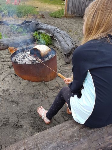 Roasting marshmellows  in front of the Tanglewood complex