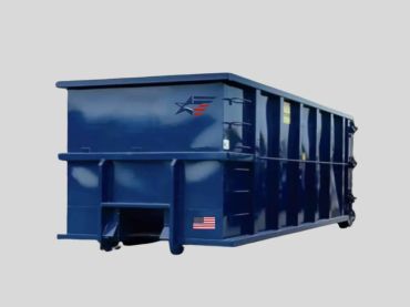 Large blue dumpster with American flag.