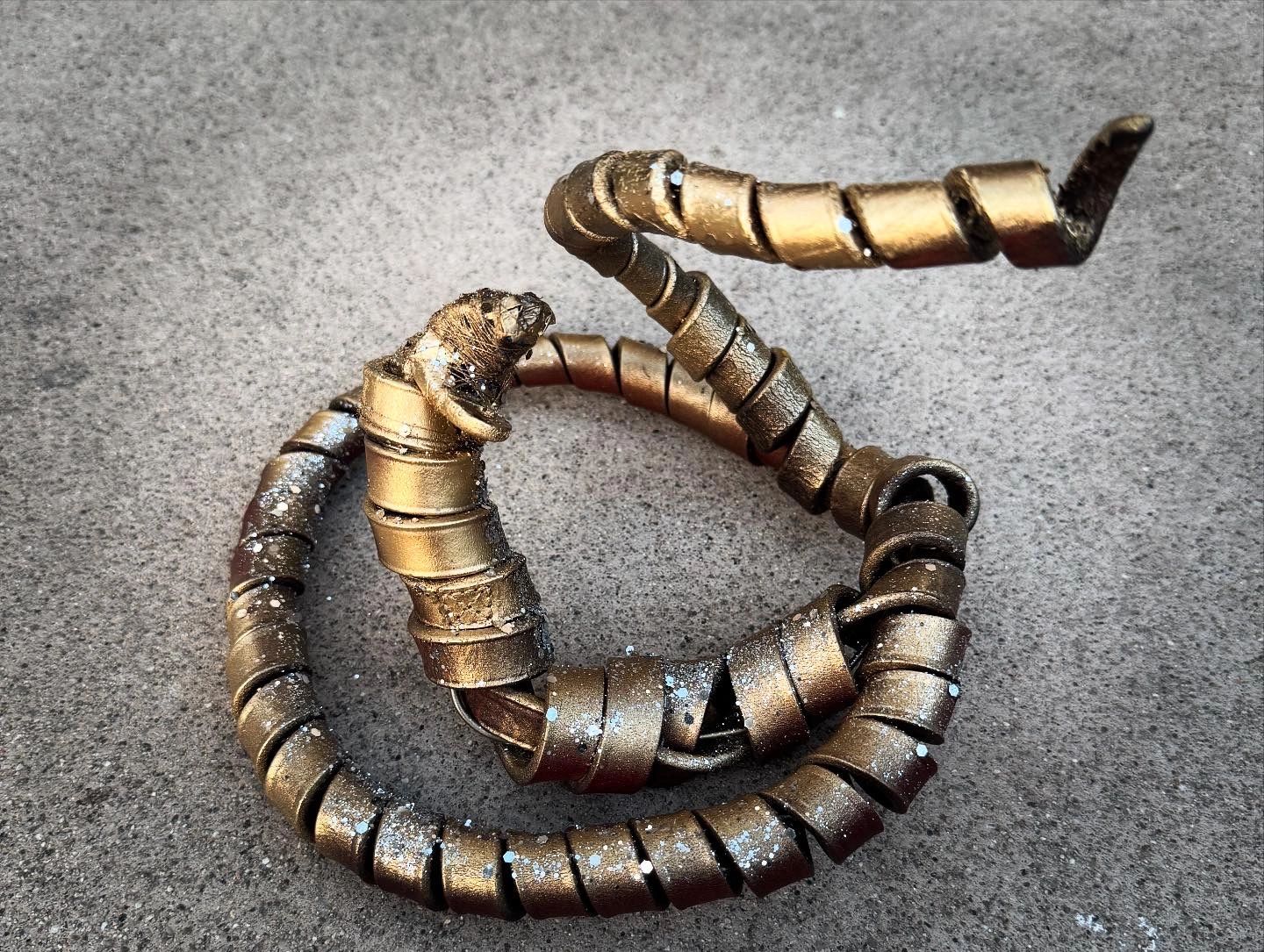 Snake made out of leather horse reins
