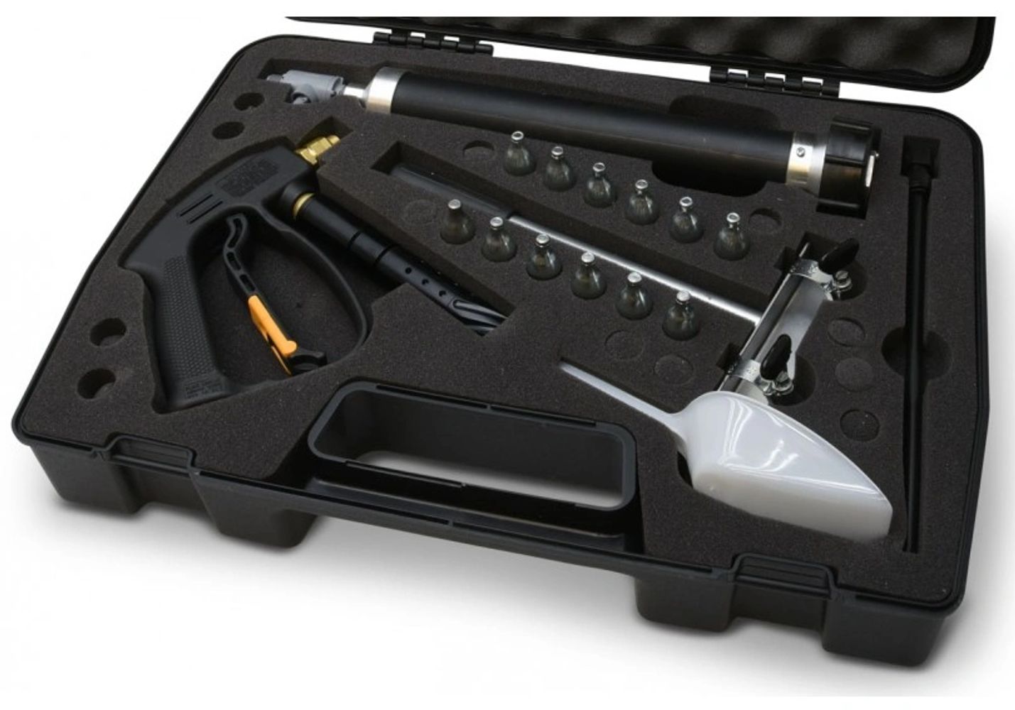 A black carrying case with a foam insert holding a pneumatic tool kit for wasp treatment