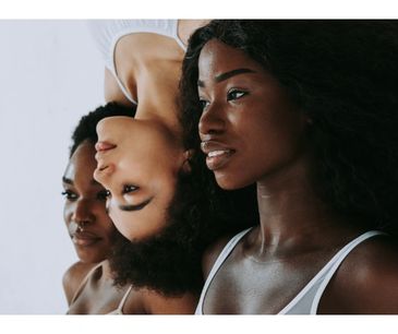 A group of women with long hair and no clothes.