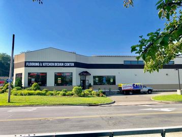 11,000 SF freestanding building with high ceilings that sits on 1 ACRE +/- lot