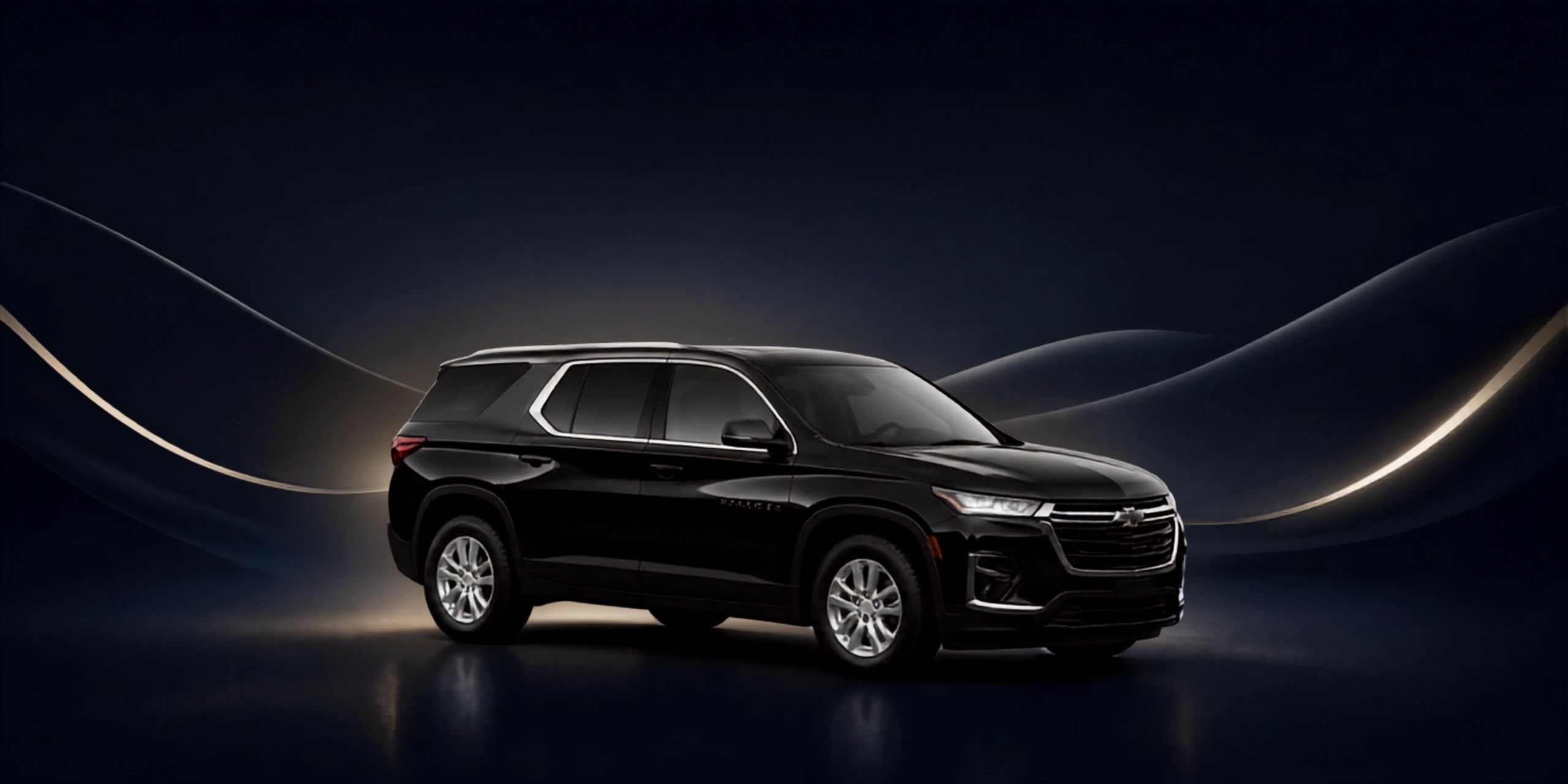 Sleek black SUV with modern design in a dark setting.
