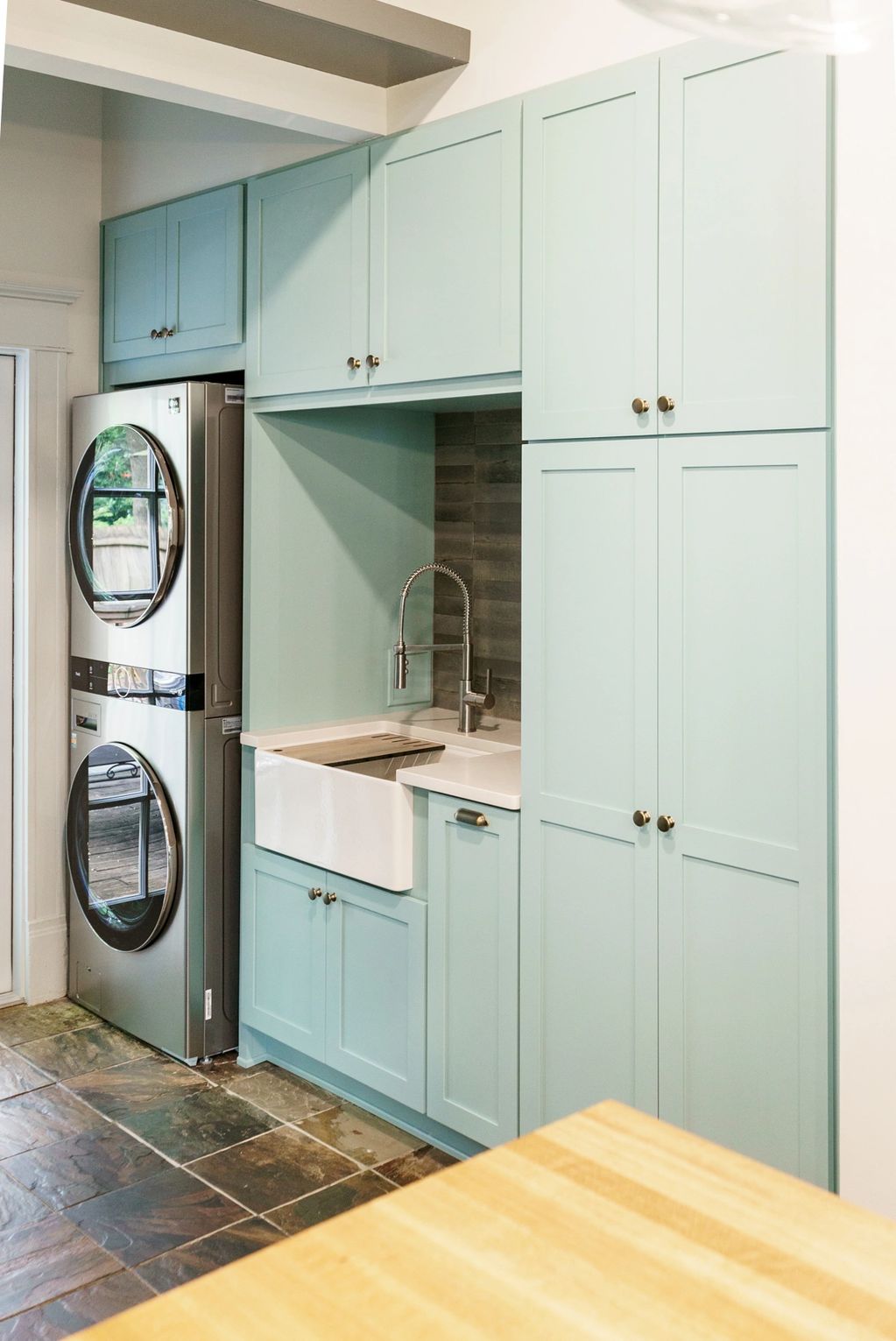 Original floors kept as sustainability purpose, coordinated with new materials in design. 