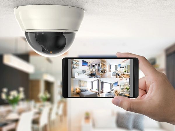hand holding 3D render mobile connect with security camera
