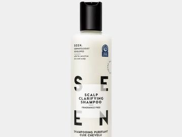 Bottle of scalp clarifying shampoo.