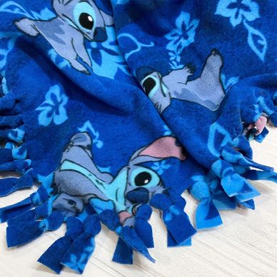 Disney no sew fleece blanket featuring the character Stitch