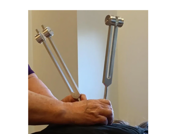 Weighted tuning forks to move tension out of the body.
