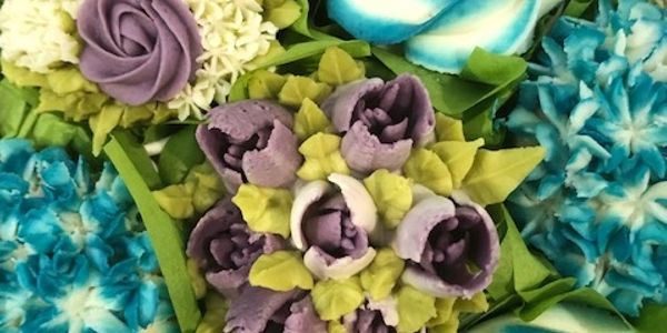 Classic cupcake bouquets are a beautiful floral presentation for all occasions.