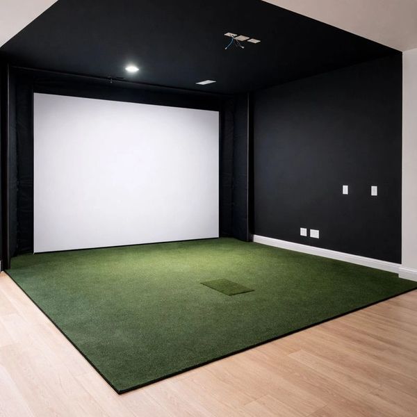Finished custom indoor golf simulator designed and installed in a St. Louis home