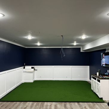 Phase two of St Louis custom basement golf simulator installation.