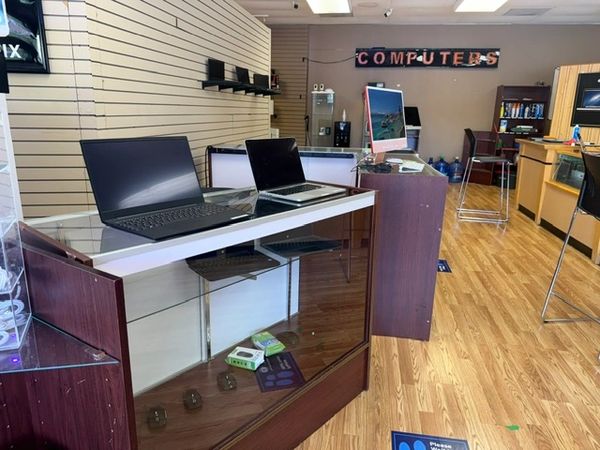 Laptop kept on table.