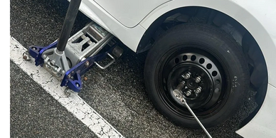 Tire change service performed by TP Towing tech