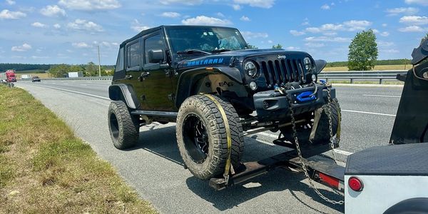 Highway tow job near busy I-275 overpass