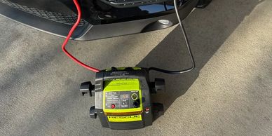 Jump-start service performed by TP Towing tech