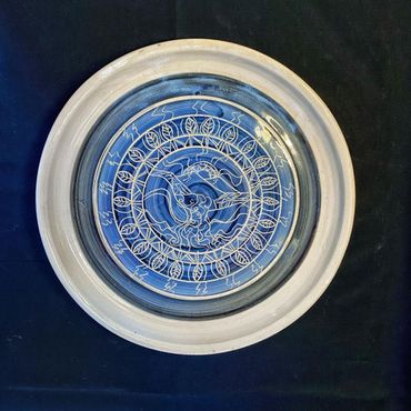 Blue landscape platter with leaf frame. All hand etched and finished. 
