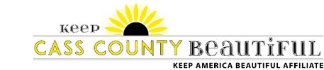 Logo of Keep Cass County Beautiful with a sunflower design.