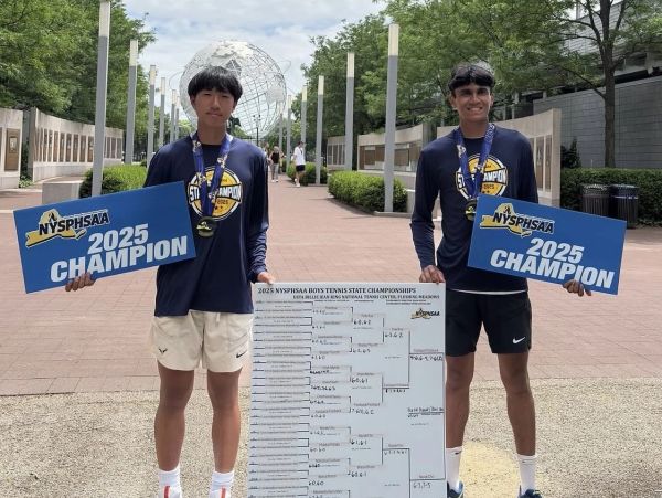 Pratik Nayak with his teammate holding the draw and the NY Sate 2025 Doubles Champion Trophy