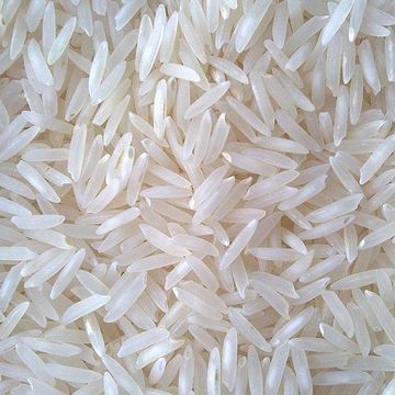 Close-up of uncooked white rice grains.