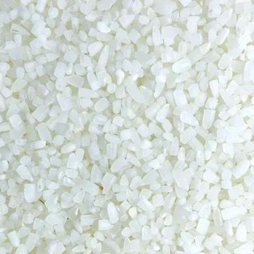 Close-up of uncooked white rice grains.