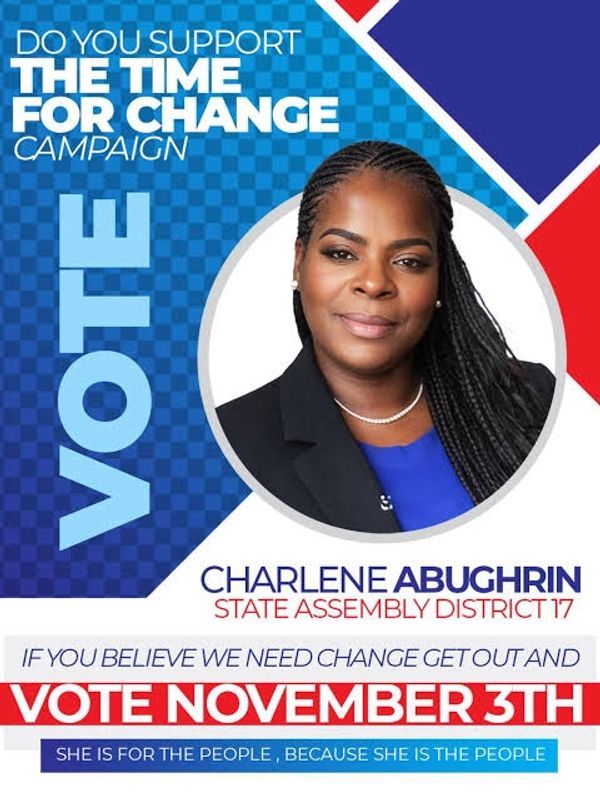 Portrait of Charlene in a professional blue shirt and navy blazer with VOTE text on a blue background.