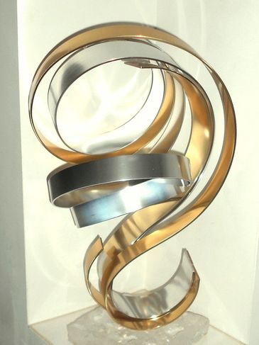 Modern metallic spiral sculpture.
