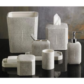 Gray textured bathroom accessory set.