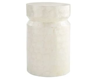 White salt container with a lid.