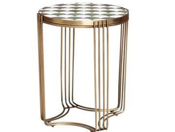 Round side table with gold metal frame and checkered top.