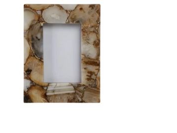 Decorative stone switch plate cover.