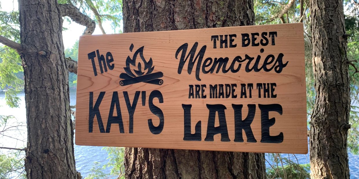 Wooden sign about memories at Kay's Lake.