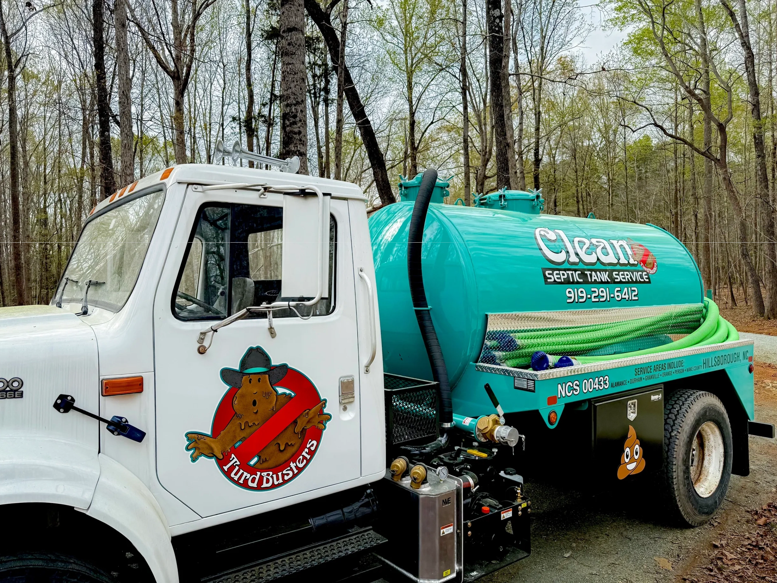 Clean Septic Tank Service Truck With Humorous 'Turd Busters' Logo