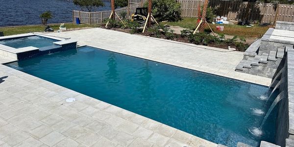 Remodel of pool with new spa, added three sheer descent waterfalls, new tile, new lights, plumbing