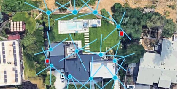Aerial view of a property with network lines overlay.
