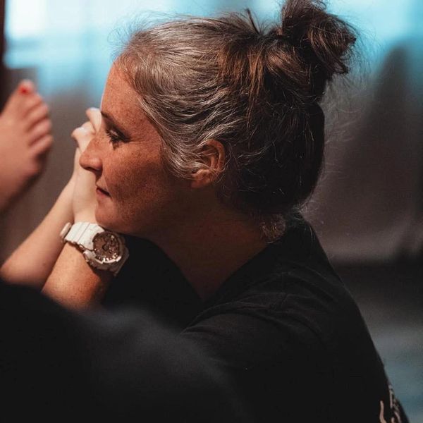 Birth doula lovingly looking at her client