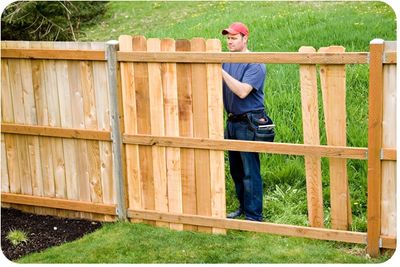 Wood privacy fence installation at a home in Moline, IL