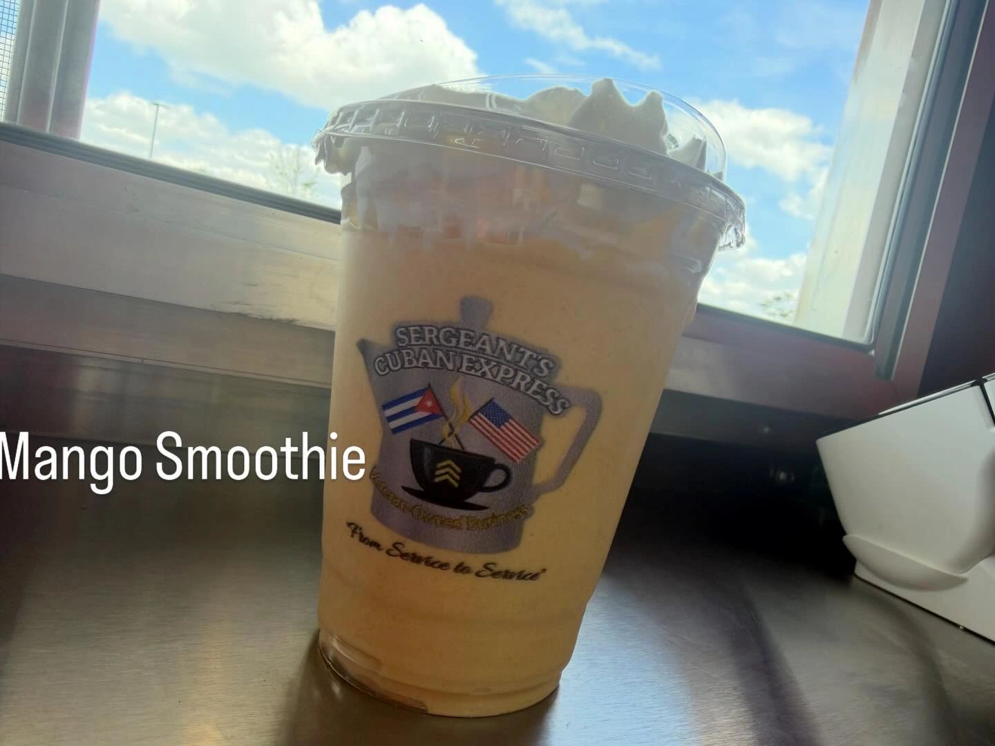 Delicious Mango Smoothie With Whipped Creme Topping